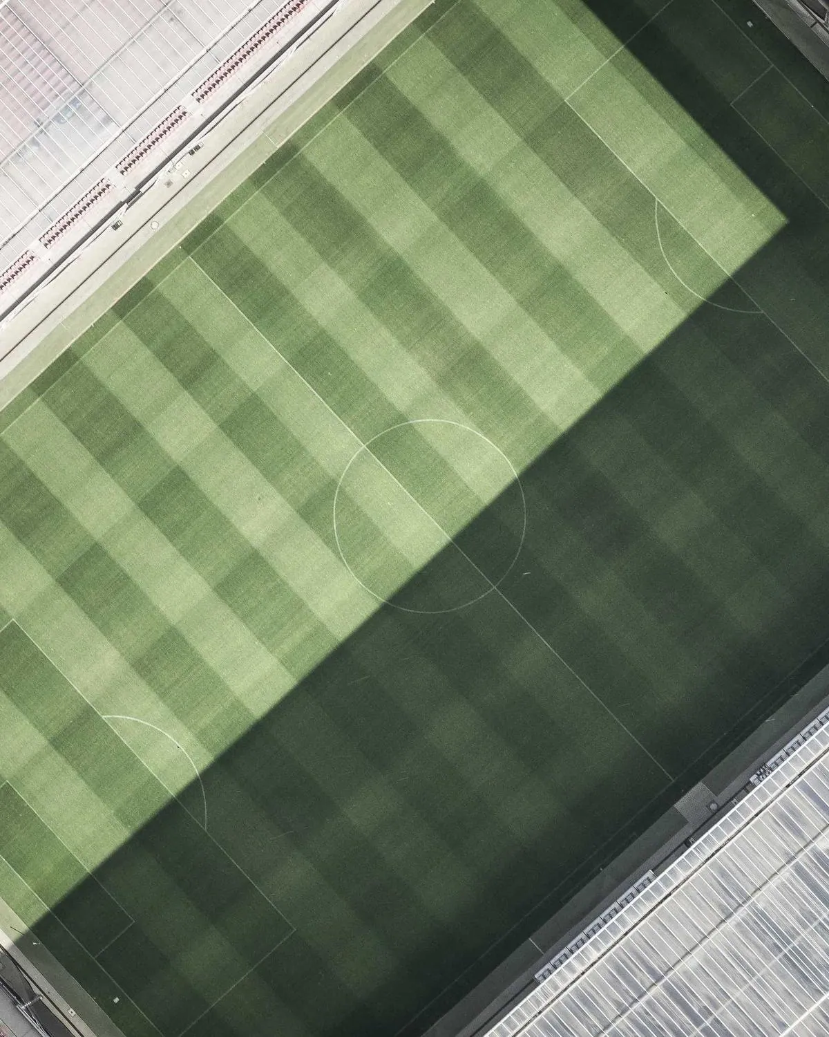 A grid of glazed roof tiles seen from directly above.